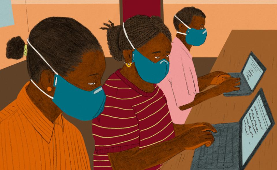 peopole connected in a community internet center, women are collaborating with each other