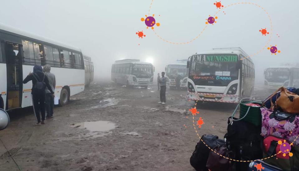 Image description: Returnees at bus stand in Manipur