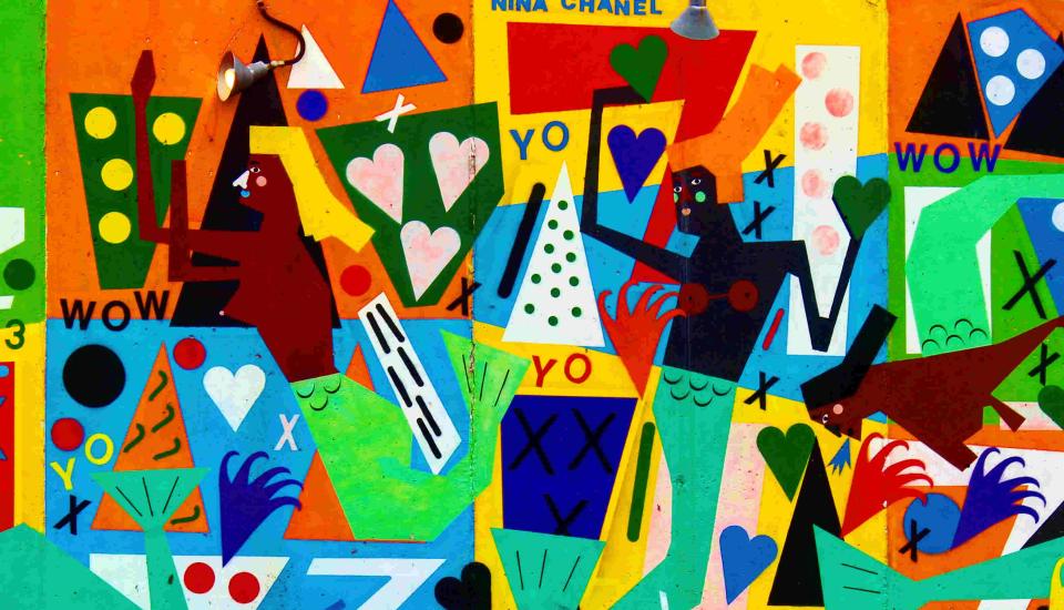 Image description: Mural depicting mermaid-like figures
