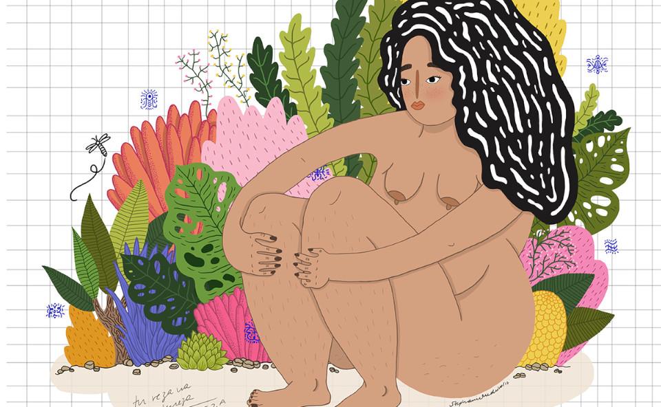 Woman sitting surrounded by plants